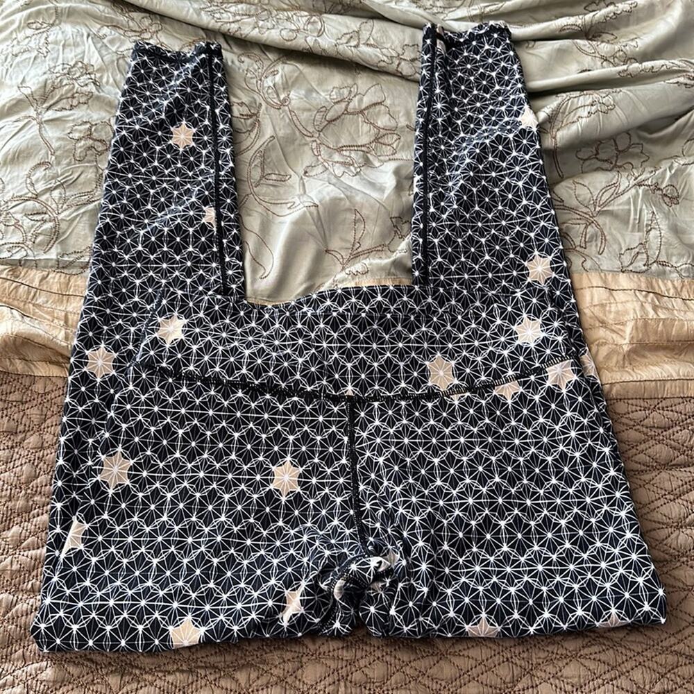 Fabletics | Black and Gold printed leggings Size S